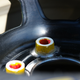 Lug nuts glued onto a wheel before the start of a NASCAR race.